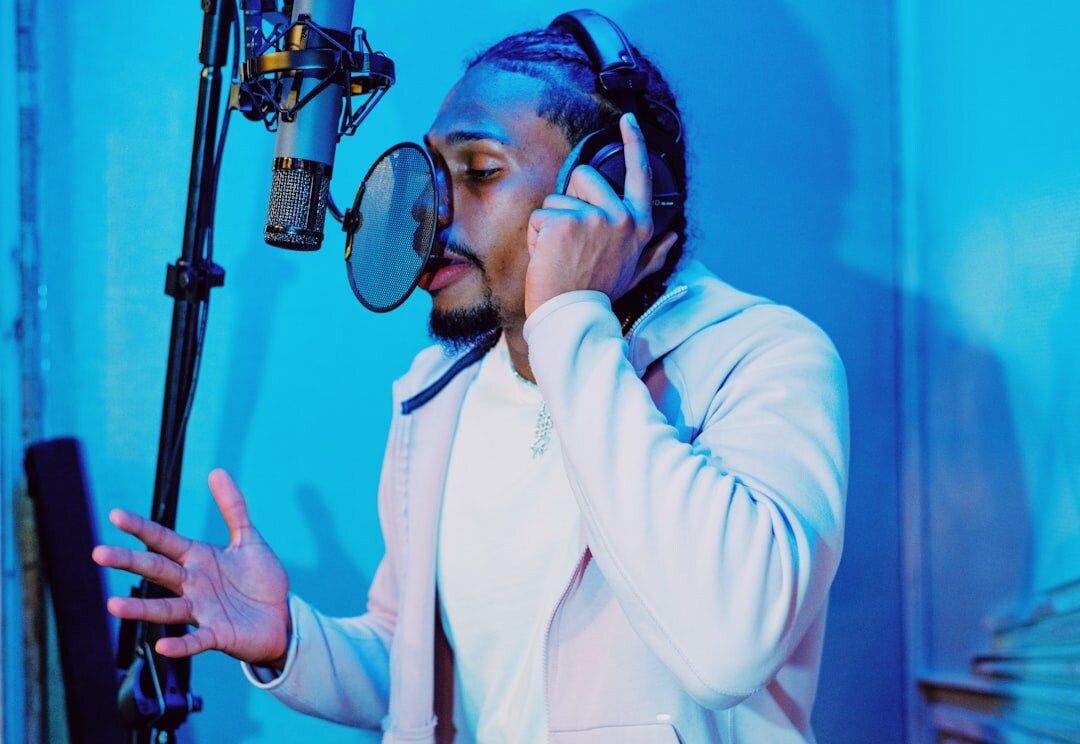 host with headphones in studio
