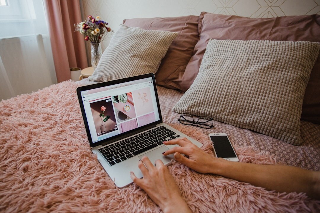 blogger writing on laptop
