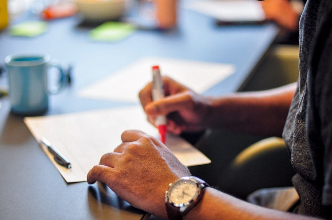 person preparing notes for interview